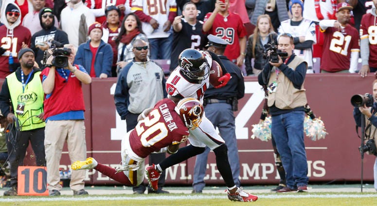 Ha Ha Clinton-Dix tries to tackle Julio Jones. Ha_Ha_Clinton_Dix_Julio_Jones