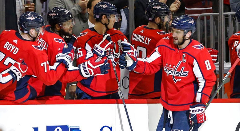 Alex Ovechkin celebrates a goal with teammates. Capitals_Goal_Ovechkin