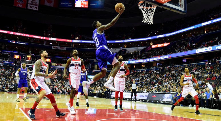 Lou Williams scores an uncontested layup against the Wizards. Wizards_Clippers