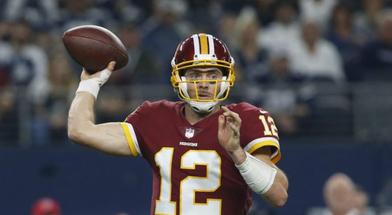 Redskins QB Colt McCoy throws a pass against Dallas. Colt_McCoy_Redskins