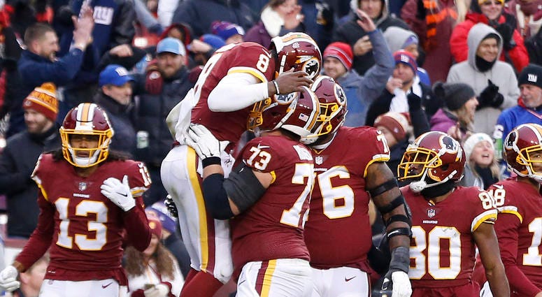 Josh Johnson celebrates with Chase Roullier after scoring a touchdown against the Giants Josh Johnson gets his first start since 2011