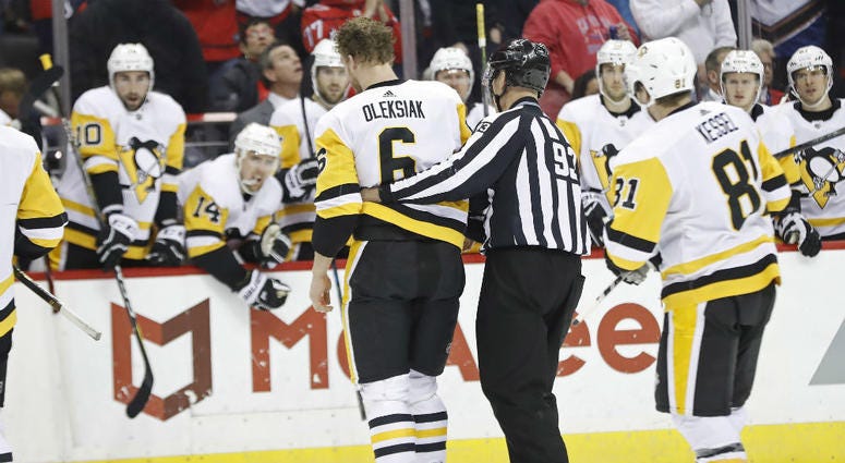 Penguins' Jamie Oleksiak needs help getting off the ice. Penguins_Jamie_Oleksiak