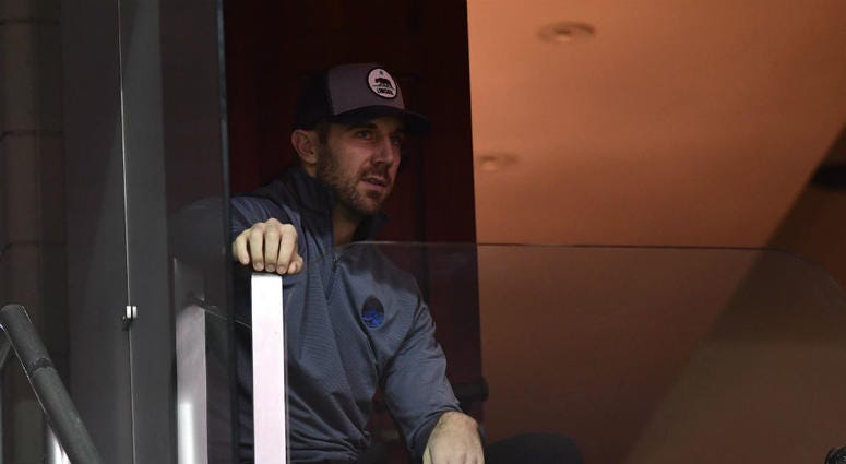 Redskins quarterback Alex Smith attends a Wizards game. Alex_Smith_Redskins