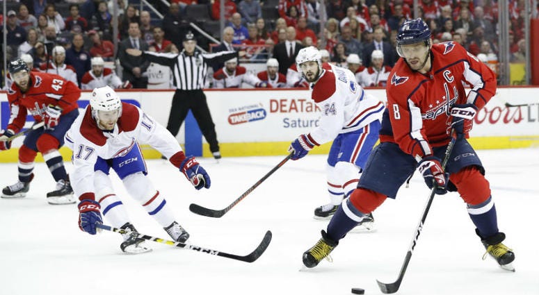 Alex Ovechkin and Caps clinch Metro Division with a 2-1 win. Washington Capitals clinched the Metropolitan Division crown.