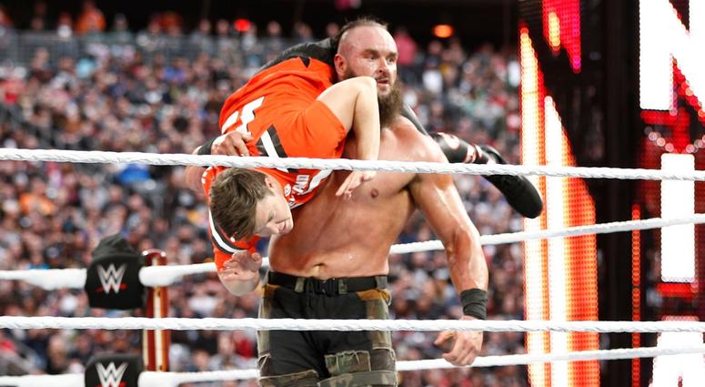 Braun Strowman Colin Jost WWE star Braun Strowman lifts Colin Jost at Wrestlemania 35 in 2019 at MetLife Stadium.