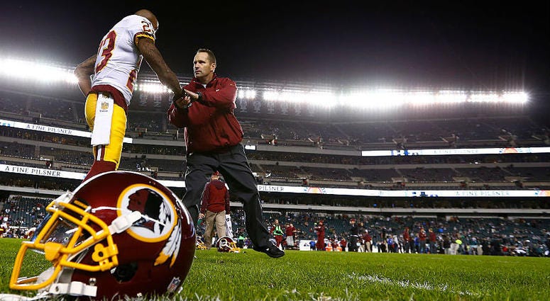 Ben Kotwica shakes hands with DeAngelo Hall before a Dec. 2015 game against the Eagles Ben Kotwica leaving Redskins to join Falcons as special teams coordinator