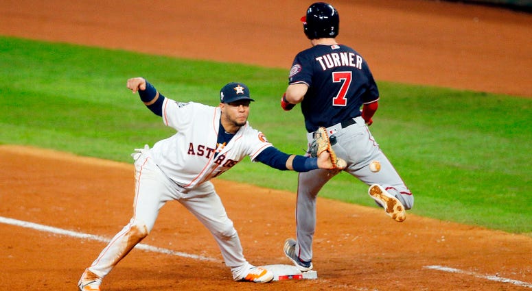 Trea Turner was called out on this play in Game 6 of the World Series. Best pictures of World Series umpire controversy, Dave Martinez ejection