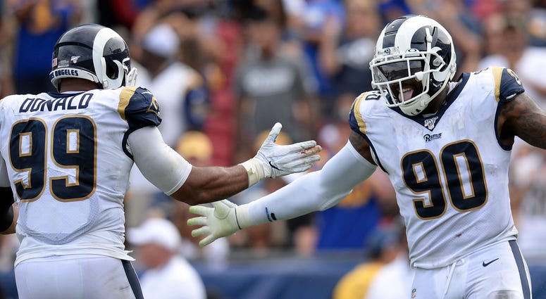 Defensive Tackle Michael Brockers celebrates after recording a tackle