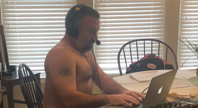 Jeremy wears his Sunday best while broadcasting from his dinning room