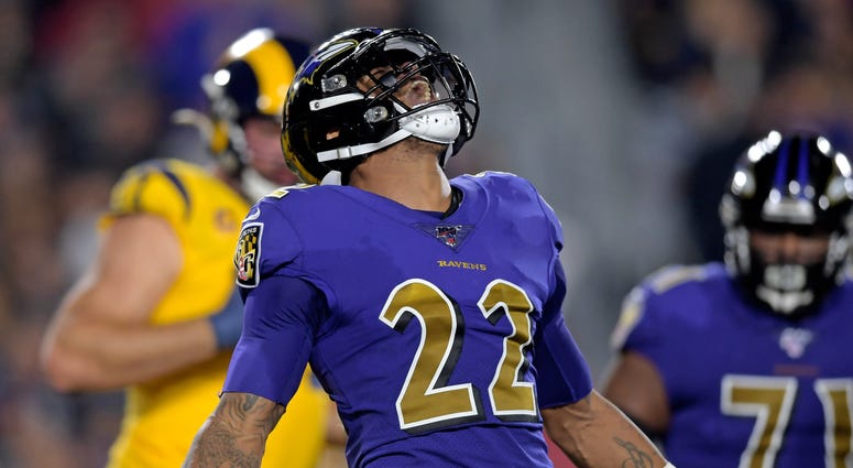 Jimmy Smith reacts after sacking Jared Goff.