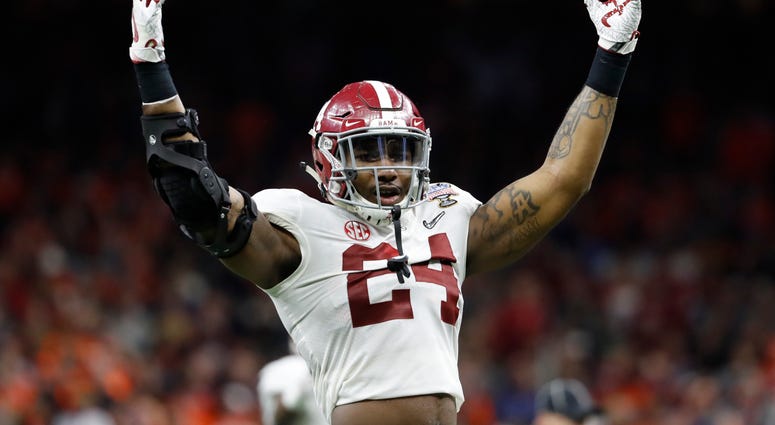 Terrell Lewis celebrates after making a play against Clemson