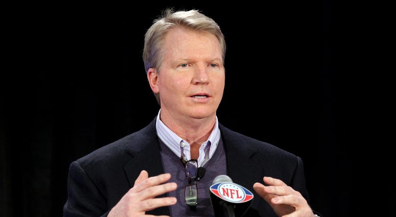 Phil Simms speaks at the Fed Ex Air and Ground Player of the year award press conference