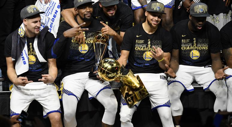Klay Thompson (left) and forward Kevin Durant (middle) and guard Stephen Curry (right) celebrate after defeating the Cleveland Cavaliers in game four of the 2018 NBA Finals Klay Thompson (left) and forward Kevin Durant (middle) and guard Stephen Curry (right) celebrate after defeating the Cleveland Cavaliers in game four of the 2018 NBA Finals