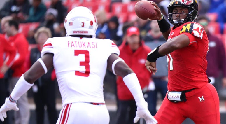 NCAA Football: Rutgers at Maryland Oct 13, 2018; College Park, MD, USA; Maryland Terrapins quarterback Kasim Hill (11) throws against Rutgers Scarlet Knights linebacker Olakunle Fatukasi (3) at Capital One Field at Maryland Stadium. Mandatory Credit: Mitch Stringer-USA TODAY Sports