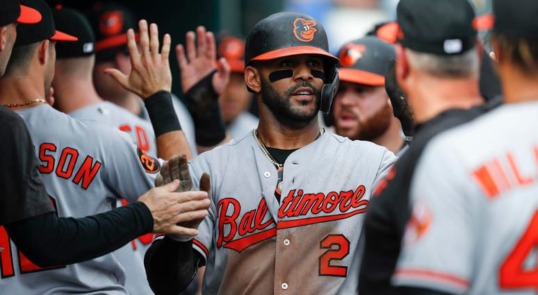 Jonathan Villar high-fives his Oriole teammates