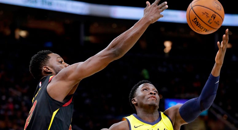 Cavaliers' Jeff Green, left, and Indiana Pacers' Victor Oladipo (4) battle for a rebound in the first half of Game 1 of an NBA basketball first-round playoff series Cavaliers' Jeff Green, left, and Indiana Pacers' Victor Oladipo (4) battle for a rebound in the first half of Game 1 of an NBA basketball first-round playoff series