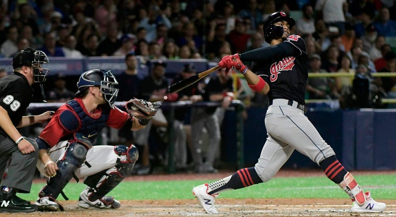 Cleveland Indians' infielder Francisco Lindor hits a home run against the Cincinnati Indians during the fifth inning of game one of a two-game MLB Series at Hiram Bithorn Stadium in San Juan, Puerto Rico, Tuesday, April 17, 2018. Cleveland Indians' infielder Francisco Lindor hits a home run against the Cincinnati Indians during the fifth inning of game one of a two-game MLB Series at Hiram Bithorn Stadium in San Juan, Puerto Rico, Tuesday, April 17, 2018.