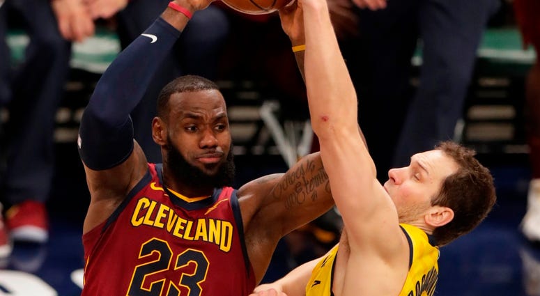 Cleveland Cavaliers forward LeBron James (23) shoots over Indiana Pacers forward Bojan Bogdanovic (44) during the first half of Game 4 of an NBA basketball first-round playoff series in Indianapolis, Sunday, April 22, 2018. Cleveland Cavaliers forward LeBron James (23) shoots over Indiana Pacers forward Bojan Bogdanovic (44) during the first half of Game 4 of an NBA basketball first-round playoff series in Indianapolis, Sunday, April 22, 2018.