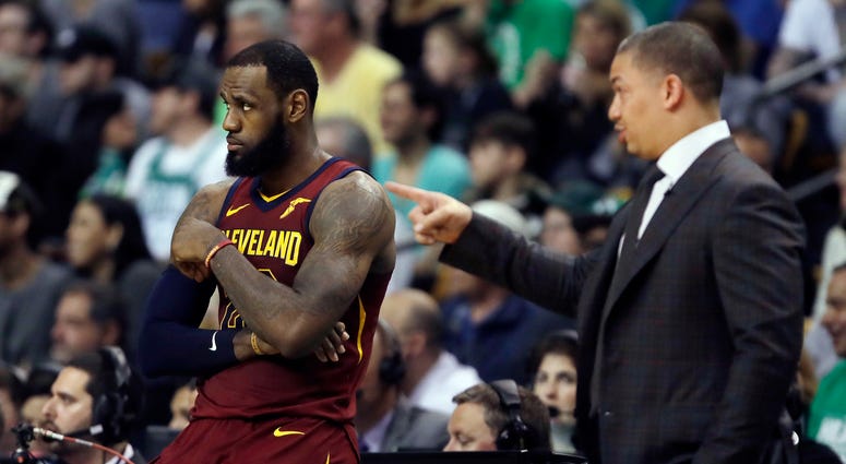 avaliers coach Tyronn Lue, right, speaks to LeBron James during a timeout in the first half in Game 2 of the team's NBA basketball Eastern Conference finals against the Boston Celtics avaliers coach Tyronn Lue, right, speaks to LeBron James during a timeout in the first half in Game 2 of the team's NBA basketball Eastern Conference finals against the Boston Celtics