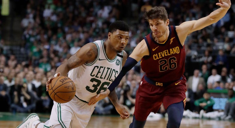 Boston Celtics guard Marcus Smart, left, drives against Cleveland Cavaliers guard Kyle Korver during the second half in Game 2 of the NBA basketball Eastern Conference finals, Tuesday, May 15, 2018, in Boston. Boston Celtics guard Marcus Smart, left, drives against Cleveland Cavaliers guard Kyle Korver during the second half in Game 2 of the NBA basketball Eastern Conference finals, Tuesday, May 15, 2018, in Boston.