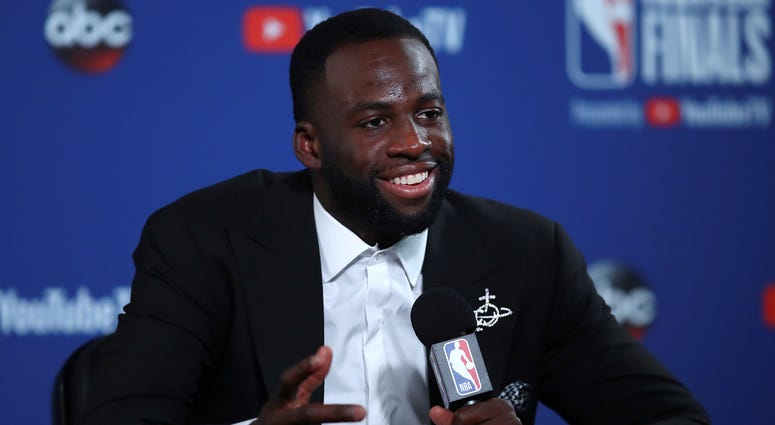 Golden State Warriors forward Draymond Green speaks at a news conference after Game 1 of basketball's NBA Finals against the Cleveland Cavaliers in Oakland, Calif., Thursday, May 31, 2018. The Warriors won 124-114 in overtime Golden State Warriors forward Draymond Green speaks at a news conference after Game 1 of basketball's NBA Finals against the Cleveland Cavaliers in Oakland, Calif., Thursday, May 31, 2018. The Warriors won 124-114 in overtime