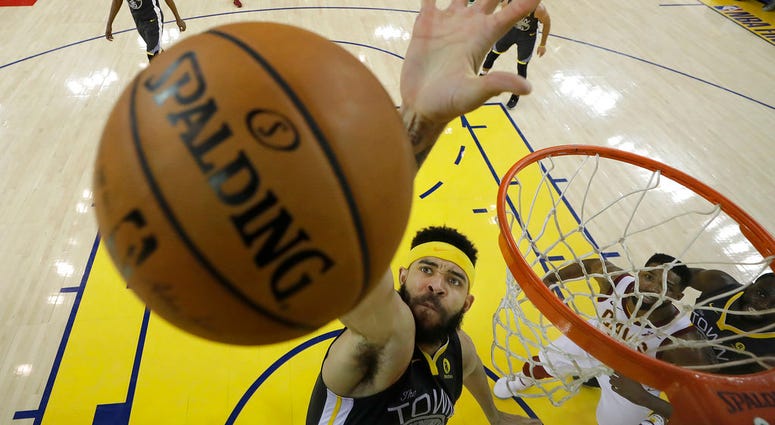 Golden State Warriors center JaVale McGee (1) reaches for a rebound during the first half of Game 2 of basketball's NBA Finals between the Warriors and the Cleveland Cavaliers in Oakland, Calif., Sunday, June 3, 2018. Golden State Warriors center JaVale McGee (1) reaches for a rebound during the first half of Game 2 of basketball's NBA Finals between the Warriors and the Cleveland Cavaliers in Oakland, Calif., Sunday, June 3, 2018.