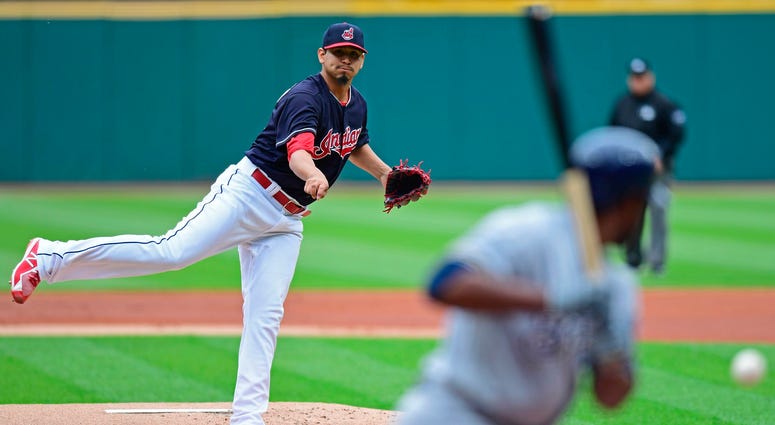 Cleveland Indians starting pitcher Carlos Carrasco delivers to Milwaukee Brewers' Jonathan Cain in the first inning of a baseball game, Wednesday, June 6, 2018, in Cleveland. Cleveland Indians starting pitcher Carlos Carrasco delivers to Milwaukee Brewers' Jonathan Cain in the first inning of a baseball game, Wednesday, June 6, 2018, in Cleveland.