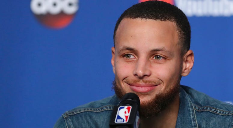 Golden State Warriors guard Stephen Curry (30) speaks during a press conference following Game 3 of basketball's NBA Finals, early Wednesday June 7, 2018, in Cleveland. The Warriors defeated the Cleveland Cavaliers 110-102 to take a 3-0 lead in the series Golden State Warriors guard Stephen Curry (30) speaks during a press conference following Game 3 of basketball's NBA Finals, early Wednesday June 7, 2018, in Cleveland. The Warriors defeated the Cleveland Cavaliers 110-102 to take a 3-0 lead in the series
