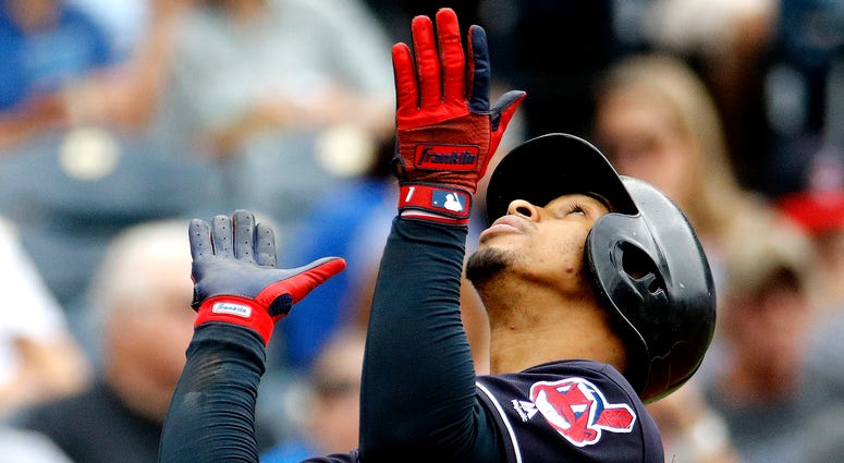 Cleveland Indians' Francisco Lindor celebrates as he crosses the plate after hitting a solo home run during the third inning of a baseball game against the Kansas City Royals Sunday, Sept. 30, 2018, in Kansas City, Mo. Cleveland Indians' Francisco Lindor celebrates as he crosses the plate after hitting a solo home run during the third inning of a baseball game against the Kansas City Royals Sunday, Sept. 30, 2018, in Kansas City, Mo.