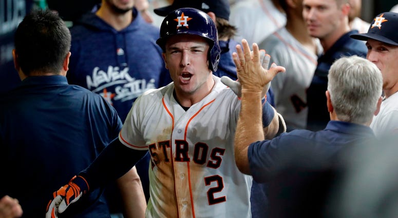 Houston Astros' Alex Bregman (2) celebrates after hitting a solo home run against Cleveland Indians' pitcher Trevor Bauer during the seventh inning of Game 2 of a baseball American League Division Series, Saturday, Oct. 6, 2018, in Houston. Houston Astros' Alex Bregman (2) celebrates after hitting a solo home run against Cleveland Indians' pitcher Trevor Bauer during the seventh inning of Game 2 of a baseball American League Division Series, Saturday, Oct. 6, 2018, in Houston.
