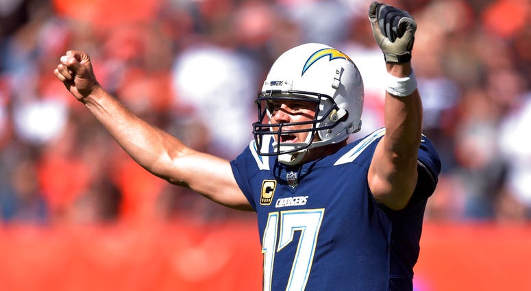 Los Angeles Chargers quarterback Philip Rivers celebrates a touchdown in the first half during an NFL football game against the Los Angeles Chargers, Sunday, Oct. 14, 2018, in Cleveland. Los Angeles Chargers quarterback Philip Rivers celebrates a touchdown in the first half during an NFL football game against the Los Angeles Chargers, Sunday, Oct. 14, 2018, in Cleveland. (AP Photo/David Richard)
