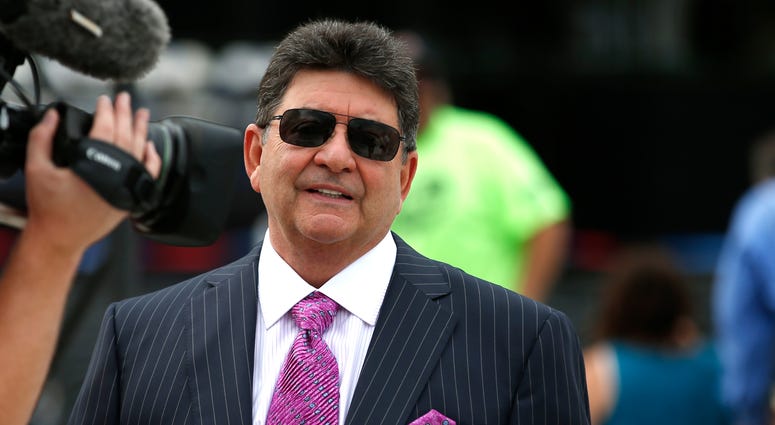 In this Aug. 8, 2015, file photo former owner of the San Francisco 49ers Edward DeBartolo, Jr., is interviewed before the Pro Football Hall of Fame ceremony at Tom Benson Hall of Fame Stadium in Canton, Ohio. President Donald Trump pardoned DeBartolo. Eddie DeBartolo Jr. pardoned
