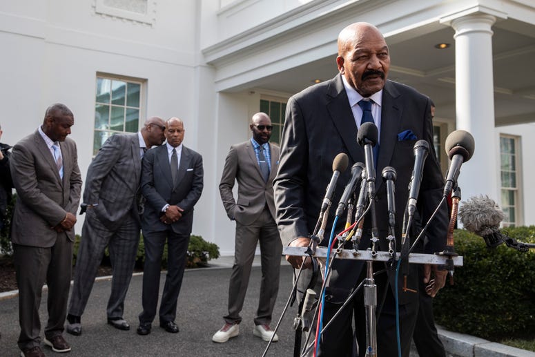 Former NFL football player Jim Brown speaks after walking out of the White House, Tuesday, Feb. 18, 2020, in Washington. It was announced that President Donald Trump has granted a full pardon to Edward DeBartolo Jr. Jim Brown White House