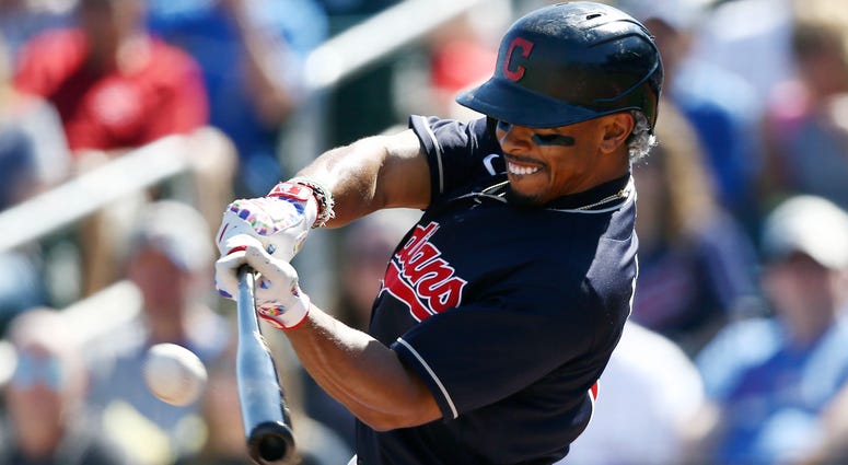 Cleveland Indians' Francisco Lindor connects for a home run against the Chicago Cubs during the first inning of a spring training baseball game Saturday, March 7, 2020, in Goodyear, Ariz. Cleveland Indians Francisco Lindor