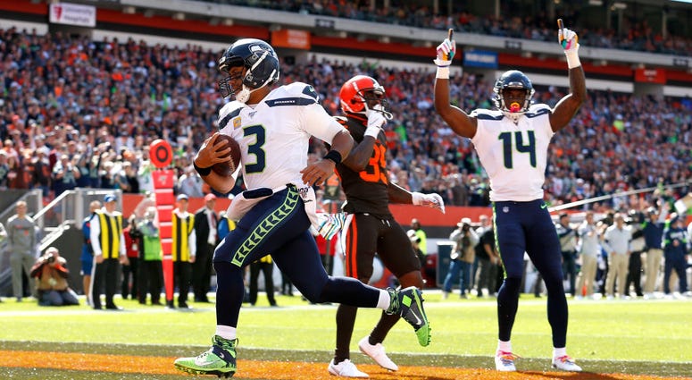 CLEVELAND, OH - OCTOBER 13: Russell Wilson #3 of the Seattle Seahawks scores a touchdown during the first quarter of the game against the Cleveland Browns at FirstEnergy Stadium on October 13, 2019 in Cleveland, Ohio. (Photo by Kirk Irwin/Getty Images) CLEVELAND, OH - OCTOBER 13: Russell Wilson #3 of the Seattle Seahawks scores a touchdown during the first quarter of the game against the Cleveland Browns at FirstEnergy Stadium on October 13, 2019 in Cleveland, Ohio. (Photo by Kirk Irwin/Getty Images)