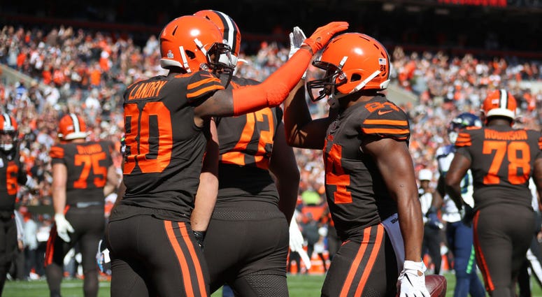 Nick Chubb #24 of the Cleveland Browns celebrates his first quarter touchdown with Jarvis Landry #80 while playing the Seattle Seahawks at FirstEnergy Stadium on October 13, 2019 in Cleveland, Ohio. Nick Chubb #24 of the Cleveland Browns celebrates his first quarter touchdown with Jarvis Landry #80 while playing the Seattle Seahawks at FirstEnergy Stadium on October 13, 2019 in Cleveland, Ohio.