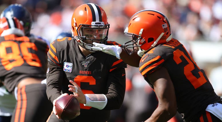 CLEVELAND, OHIO - OCTOBER 13: Baker Mayfield #6 of the Cleveland Browns hands off to Nick Chubb #24 for a second quarter run while playing the Seattle Seahawks at FirstEnergy Stadium on October 13, 2019 in Cleveland, Ohio. (Photo by Gregory Shamus/Getty I CLEVELAND, OHIO - OCTOBER 13: Baker Mayfield #6 of the Cleveland Browns hands off to Nick Chubb #24 for a second quarter run while playing the Seattle Seahawks at FirstEnergy Stadium on October 13, 2019 in Cleveland, Ohio. (Photo by Gregory Shamus/Getty I