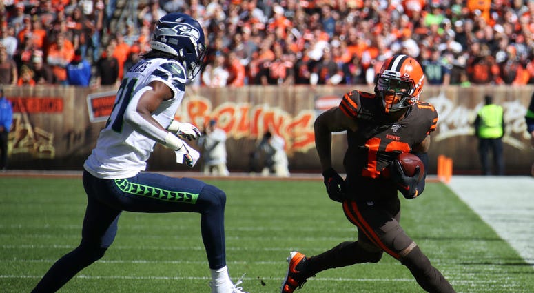 CLEVELAND, OHIO - OCTOBER 13: Odell Beckham #13 of the Cleveland Browns looks for yards after a first quarter catch next to Tre Flowers #21 of the Seattle Seahawks at FirstEnergy Stadium on October 13, 2019 in Cleveland, Ohio. (Photo by Gregory Shamus/Get CLEVELAND, OHIO - OCTOBER 13: Odell Beckham #13 of the Cleveland Browns looks for yards after a first quarter catch next to Tre Flowers #21 of the Seattle Seahawks at FirstEnergy Stadium on October 13, 2019 in Cleveland, Ohio. (Photo by Gregory Shamus/Get