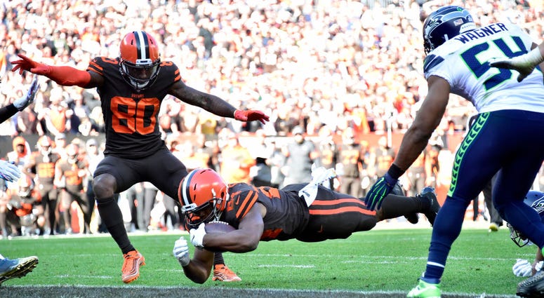 CLEVELAND, OHIO - OCTOBER 13: Jarvis Landry #80 watches as Nick Chubb #24 of the Cleveland Browns scores during the second half against the Seattle Seahawks at FirstEnergy Stadium on October 13, 2019 in Cleveland, Ohio. CLEVELAND, OHIO - OCTOBER 13: Jarvis Landry #80 watches as Nick Chubb #24 of the Cleveland Browns scores during the second half against the Seattle Seahawks at FirstEnergy Stadium on October 13, 2019 in Cleveland, Ohio.