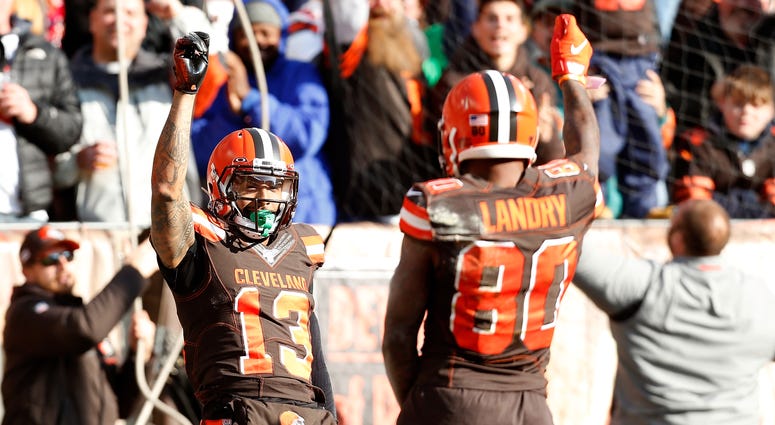 Odell Beckham Jr. #13 of the Cleveland Browns celebrates with Jarvis Landry #80 after scoring a touchdown during the first quarter of the game against the Miami Dolphins at FirstEnergy Stadium on November 24, 2019 in Cleveland, Ohio. Jarvis Landry Odell Beckham Jr. Cleveland Browns
