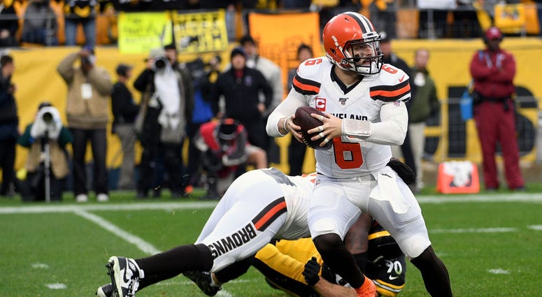 Baker Mayfield #6 of the Cleveland Browns scrambles out of the pocket in the second quarter during the game against the Pittsburgh Steelers at Heinz Field Baker Mayfield #6 of the Cleveland Browns scrambles out of the pocket in the second quarter during the game against the Pittsburgh Steelers at Heinz Field