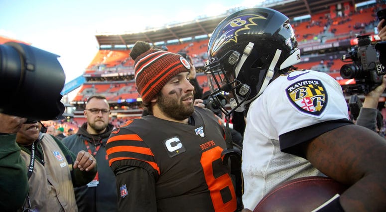 CLEVELAND, OH - DECEMBER 22: Lamar Jackson #8 of the Baltimore Ravens shakes hands with Baker Mayfield #6 of the Cleveland Browns after the game at FirstEnergy Stadium on December 22, 2019 in Cleveland, Ohio. Baltimore defeated Cleveland 31-15. (Photo by