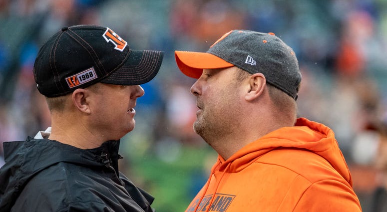 Head coach Zac Taylor of the Cincinnati Bengals and head coach Freddie Kitchens of the Cleveland Browns meet at midfield after the game between the Cincinnati Bengals and the Cleveland Browns at Paul Brown Stadium on December 29, 2019 in Cincinnati, Ohio. Head coach Zac Taylor of the Cincinnati Bengals and head coach Freddie Kitchens of the Cleveland Browns meet at midfield after the game between the Cincinnati Bengals and the Cleveland Browns at Paul Brown Stadium on December 29, 2019 in Cincinnati, Ohio.