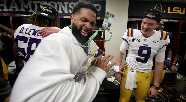 Odell Beckham Jr. celebrates in the locker room with Joe Burrow #9 of the LSU Tigers after their 42-25 win over Clemson Tigers in the College Football Playoff National Championship game at Mercedes Benz Superdome on January 13, 2020. Odell Beckham Jr. LSU celebration