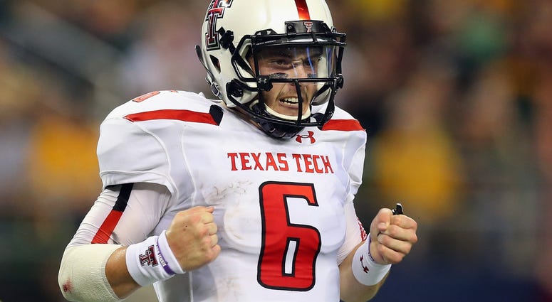 ARLINGTON, TX - NOVEMBER 16: Baker Mayfield #6 of the Texas Tech Red Raiders celebrates his second touchdown pass against the Baylor Bears at AT&T Stadium on November 16, 2013 in Arlington, Texas. (Photo by Ronald Martinez/Getty Images) ARLINGTON, TX - NOVEMBER 16: Baker Mayfield #6 of the Texas Tech Red Raiders celebrates his second touchdown pass against the Baylor Bears at AT&T Stadium on November 16, 2013 in Arlington, Texas. (Photo by Ronald Martinez/Getty Images)