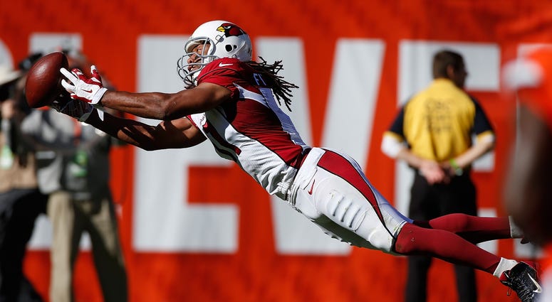 CLEVELAND, OH - NOVEMBER 01: Larry Fitzgerald #11 of the Arizona Cardinals can't pull in a second quarter catch while playing the Cleveland Browns at FirstEnergy Stadium on November 1, 2015 in Cleveland, Ohio. (Photo by Gregory Shamus/Getty Images) CLEVELAND, OH - NOVEMBER 01: Larry Fitzgerald #11 of the Arizona Cardinals can't pull in a second quarter catch while playing the Cleveland Browns at FirstEnergy Stadium on November 1, 2015 in Cleveland, Ohio. (Photo by Gregory Shamus/Getty Images)