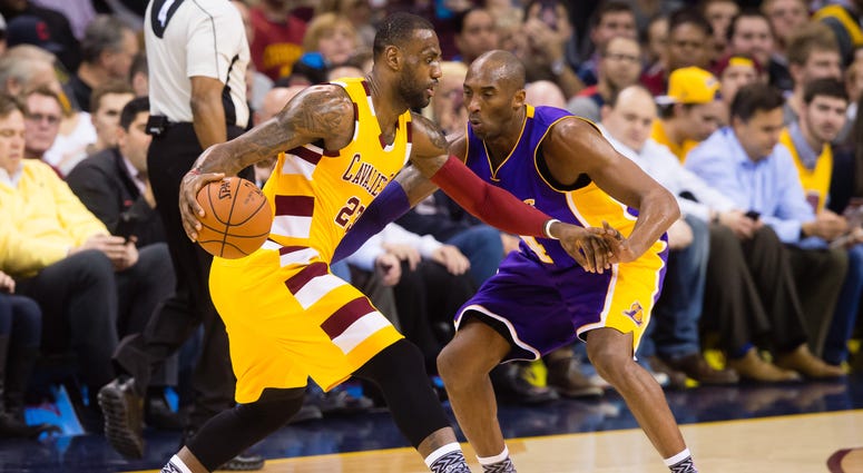 Kobe Bryant #24 of the Los Angeles Lakers guards LeBron James #23 of the Cleveland Cavaliers during the first half at Quicken Loans Arena on February 10, 2016 in Cleveland, Ohio Kobe Bryant Los Angeles Lakers LeBron James Cleveland Cavaliers