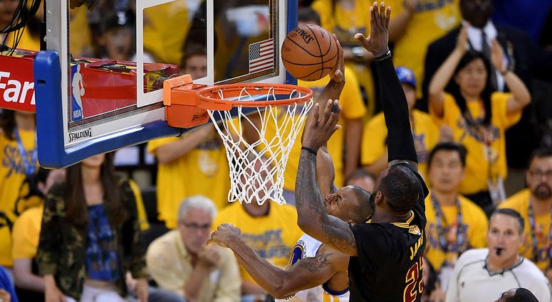 OAKLAND, CA - JUNE 19: LeBron James #23 of the Cleveland Cavaliers blocks a shot by Andre Iguodala #9 of the Golden State Warriors in Game 7 of the 2016 NBA Finals at ORACLE Arena on June 19, 2016 in Oakland, California. NOTE TO USER: User expressly ackno OAKLAND, CA - JUNE 19: LeBron James #23 of the Cleveland Cavaliers blocks a shot by Andre Iguodala #9 of the Golden State Warriors in Game 7 of the 2016 NBA Finals at ORACLE Arena on June 19, 2016 in Oakland, California. NOTE TO USER: User expressly ackno