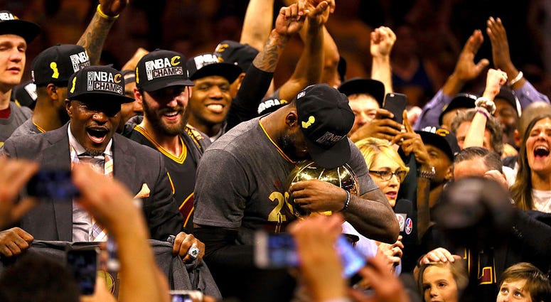 OAKLAND, CA - JUNE 19: LeBron James #23 of the Cleveland Cavaliers holds the Larry O'Brien Championship Trophy after defeating the Golden State Warriors 93-89 in Game 7 of the 2016 NBA Finals at ORACLE Arena on June 19, 2016 in Oakland, California. NOTE T OAKLAND, CA - JUNE 19: LeBron James #23 of the Cleveland Cavaliers holds the Larry O'Brien Championship Trophy after defeating the Golden State Warriors 93-89 in Game 7 of the 2016 NBA Finals at ORACLE Arena on June 19, 2016 in Oakland, California. NOTE T