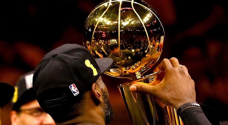 OAKLAND, CA - JUNE 19: LeBron James #23 of the Cleveland Cavaliers holds the Larry O'Brien Championship Trophy after defeating the Golden State Warriors 93-89 in Game 7 of the 2016 NBA Finals at ORACLE Arena on June 19, 2016 in Oakland, California. NOTE T OAKLAND, CA - JUNE 19: LeBron James #23 of the Cleveland Cavaliers holds the Larry O'Brien Championship Trophy after defeating the Golden State Warriors 93-89 in Game 7 of the 2016 NBA Finals at ORACLE Arena on June 19, 2016 in Oakland, California. NOTE T